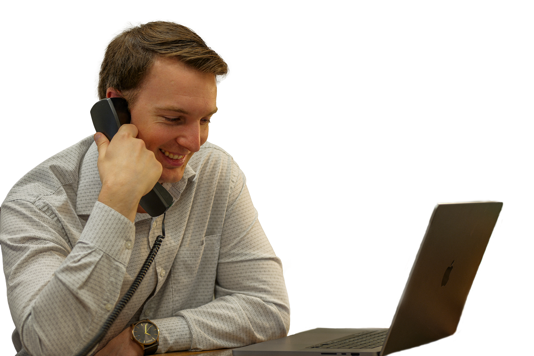 Person on phone with laptop